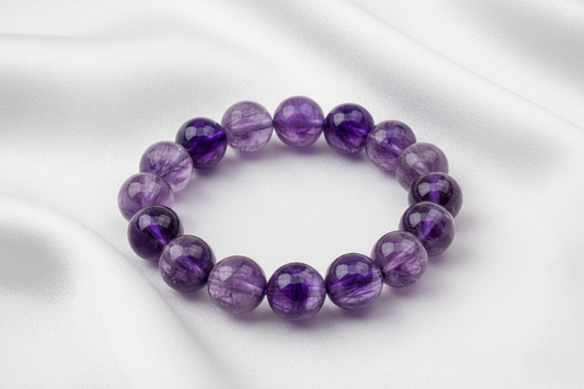Amethyst Natural Crystal Bracelet On white silk cloth with no shadow