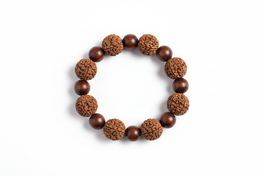 Create a premium product image of a **Rudraksha Tulsi Mixed Bracelet** made from natural Rudraksha and Tulsi wood beads. Arrange the bracelet neatly in a circular shape on a clean white background with soft shadows. Highlight the dual wood texture and spiritual protection energy of Shiva and Krishna. 1:1 square image.
