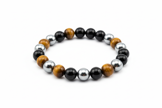 Create a premium product image of a **Triple Protection Crystal Bracelet** made with Tiger Eye, Hematite, and Black Obsidian natural stones. Arrange the bracelet neatly in a circular shape on a clean white background with soft shadows. Highlight the bold stone colors and strong evil eye protection energy. 1:1 square image.

