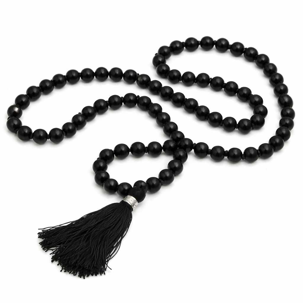 Dhivarashi black beaded mala necklace with smooth round beads and black tassel on white background