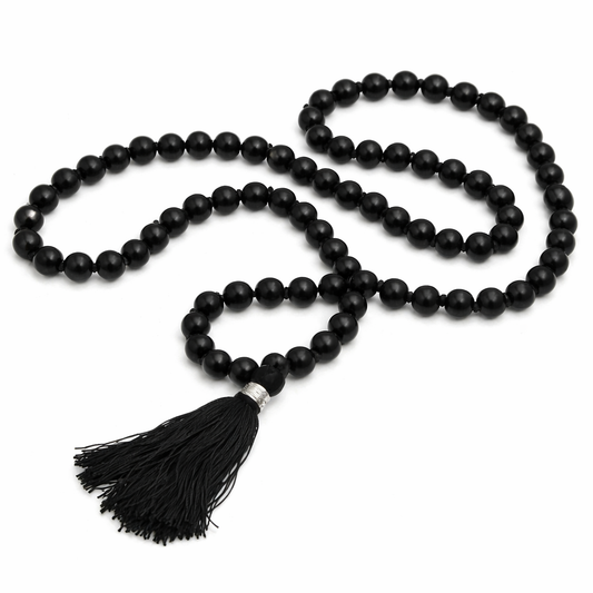 Dhivarashi black beaded mala necklace with smooth round beads and black tassel on white background