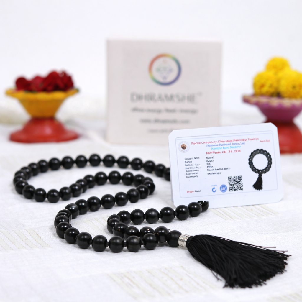 Dhivarashi black beaded mala necklace with smooth round beads and black tassel displayed with branded box and information card
