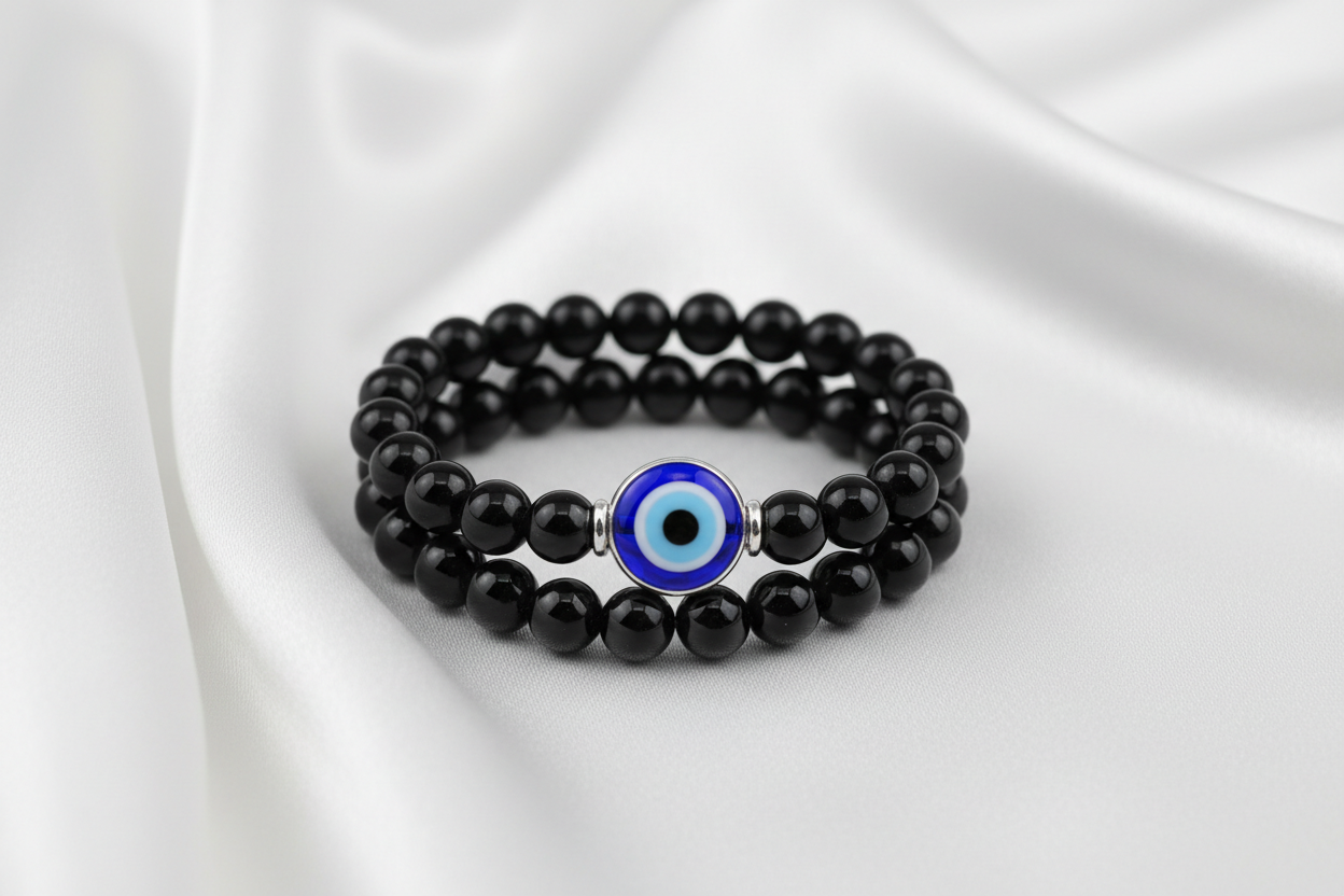 Evil Eye Onyx Natural Crystal Bracelet on silky white cloth