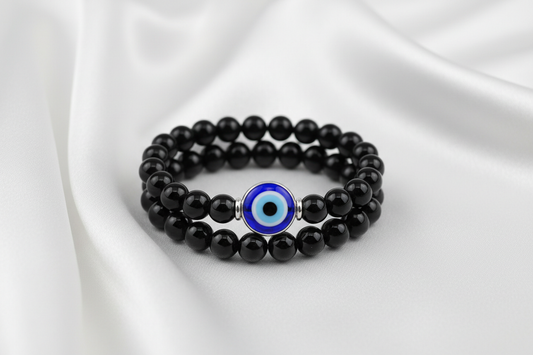 Evil Eye Onyx Natural Crystal Bracelet on silky white cloth