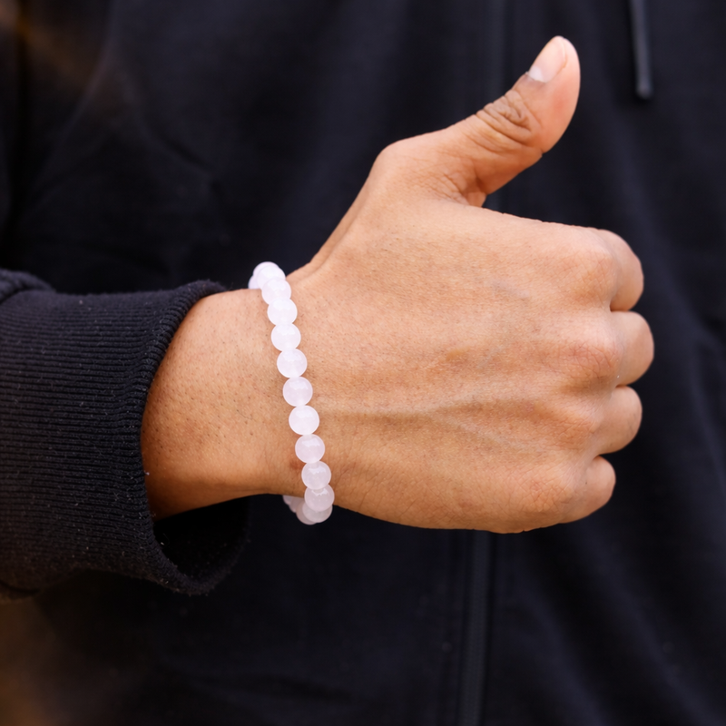 Dhivarashi Rose Quartz Love Bracelet worn on wrist, natural healing crystal jewelry for love, emotional balance and heart chakra energy.